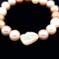 Preview: Muschelkernperlen mit Perlmutt Armband flexibel